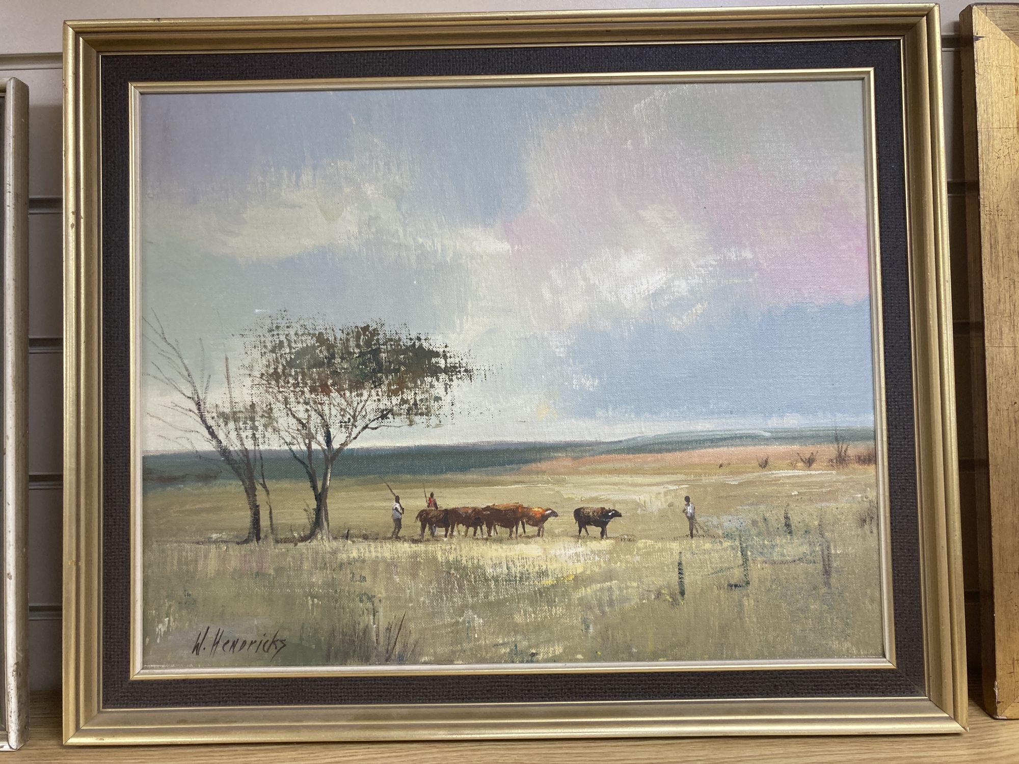 W.Hendriks, oil on canvas board, Herdsmen in a landscape, signed, 39 x 49cm